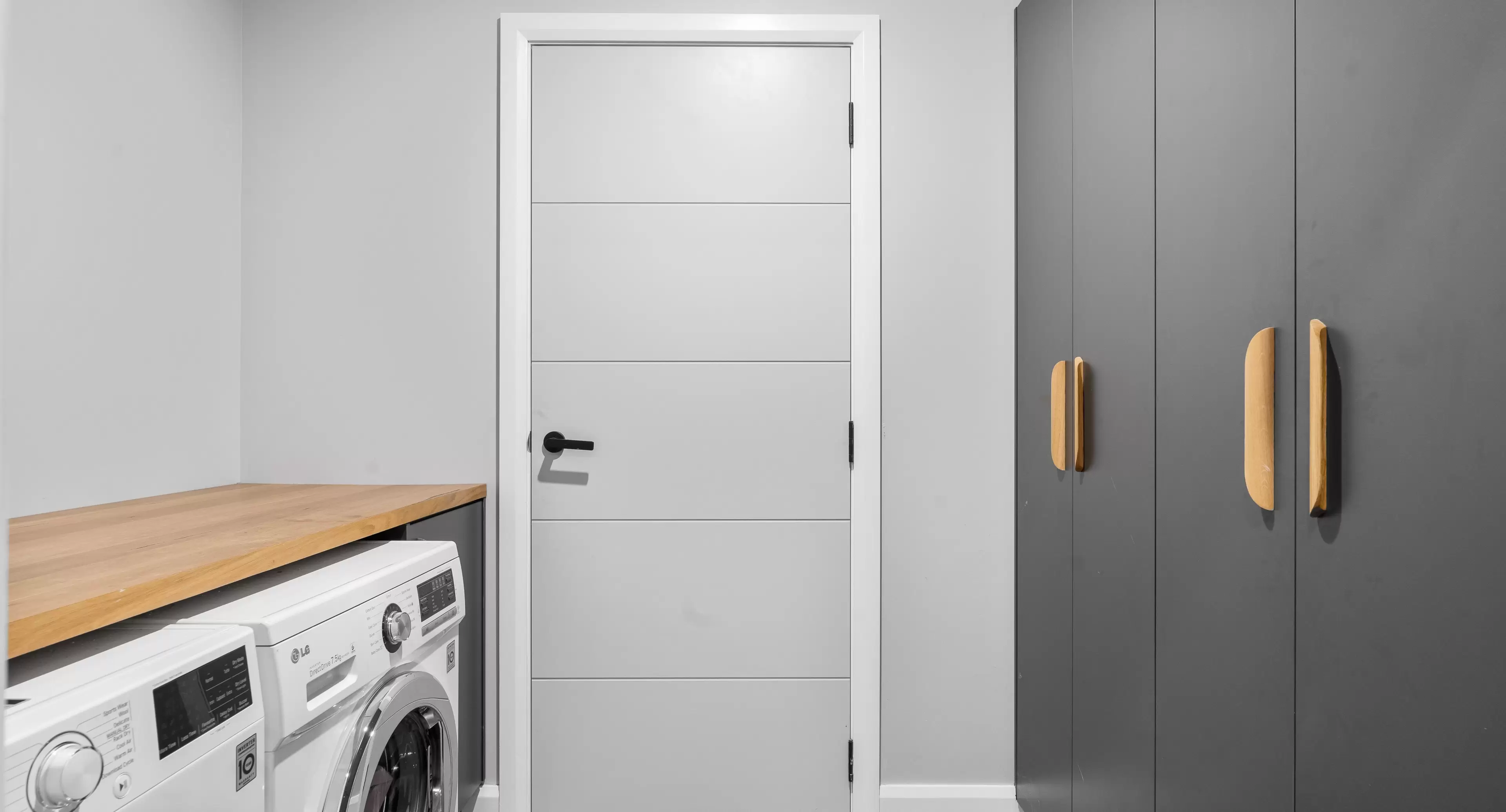 Laundry with Custom Cabinetry
